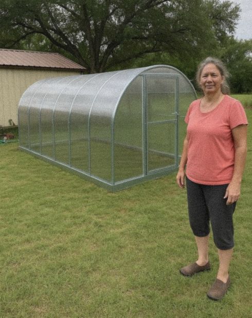 Long greenhouse on a mowed lawn
